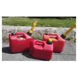 3 poly gas cans, two with spouts 1 gallon and