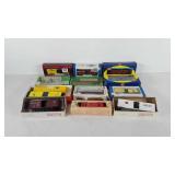 Miniature trains, twelve train cars in boxes,