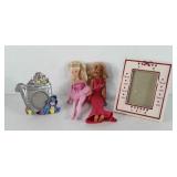 Barbies and picture frames, one Barbie marked