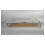Wood framed display case, frame has scuff marks,