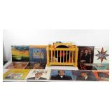 Wooden magazine rack with collection of vinyl