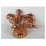 Three copper molds, includes rooster, fish and