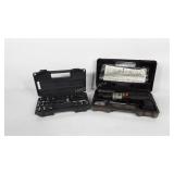 Two socket wrenches with cases, one  Popular