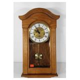 Wooden wall mounted pendulum clock, made in