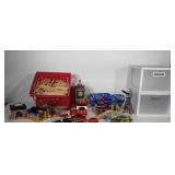 Wooden toy trains, tracks, and accessories, some