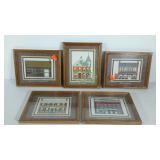 Five framed prints of historic buildings in