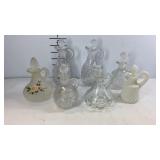 Seven glass cruet  bottles with stoppers