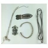 Sterling silver, 32.25g with religious pendant,