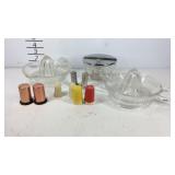 Kitchenware, two lemon presses, salt and pepper