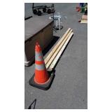 2 used safety cones, and five 3" boards
