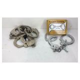 Four pairs of double lock handcuffs, only one key