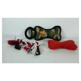 Dog toys, rope and two bone shaped chew toys, one