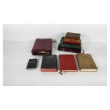 Group of Bibles, one with case