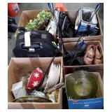 Skid lot, backpacks, luggage, shoes, cooler,