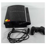 Playstation 3 console and controller, powers up