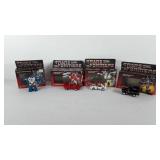Toys, four transformers in original boxes,