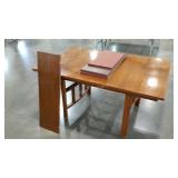 Dining table with leaf and protective cover,