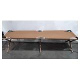 Folding military cot, ends do not fit nicely in
