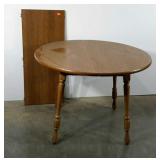 Round dining table, 42" diameter, includes an 18"