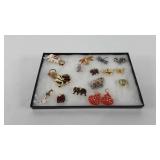 Jewelry, pendants, earrings, and broaches,