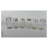 Six Mason jars, includes five Ball and one Atlas,