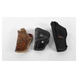 Three gun holsters for belts, includes Uncle