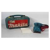 Makita sheet sander, with sanding pads and case,