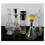 Glassware, four glass decanters and one pitcher,