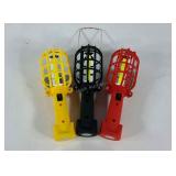 Group of three small battery operated shop lights