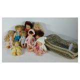 Group of dolls, doll stand, bassinets