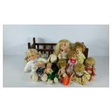 Dolls cradle with a doll group, 10 total