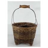Footed basket with handle, signed