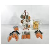 Retro orange kitchenwares, six stacking mugs with