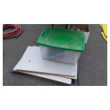 Storage Tote plus 5 misc laminated wood shelving