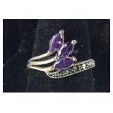 Size 7 Sterling silver ring missing a couple