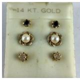 14k gold stud earrings, three pairs need cleaning