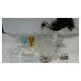 Group of glasswares, feathers, salt and pepper