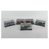 Model cars in display cases, includes Camaro,