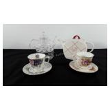 Tea group, includes Teapot, glass teapot warmer