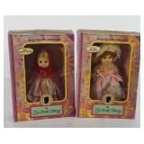 Two bookcase collectable dolls in boxes, Red