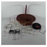 Wicker basket full of picture holders and round