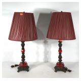 Cast metal table lamps with red poly accents,