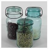 Ball and Atlas mason jars full of rice, beans,