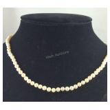 14k gold and pearl necklace 23in