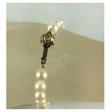 14k gold and pearl bracelet 7in