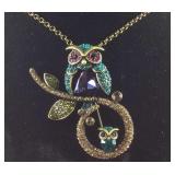 Multi crystal owl brooch/necklace 24in