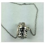 Sterling silver locket necklace with tiny