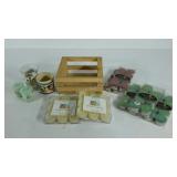 Candle group, 2 votives, 7 packages of tea