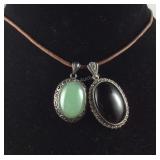 Two Sterling pendants on wax rope 14in