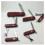 Siz Swiss Army keychain pocket knives